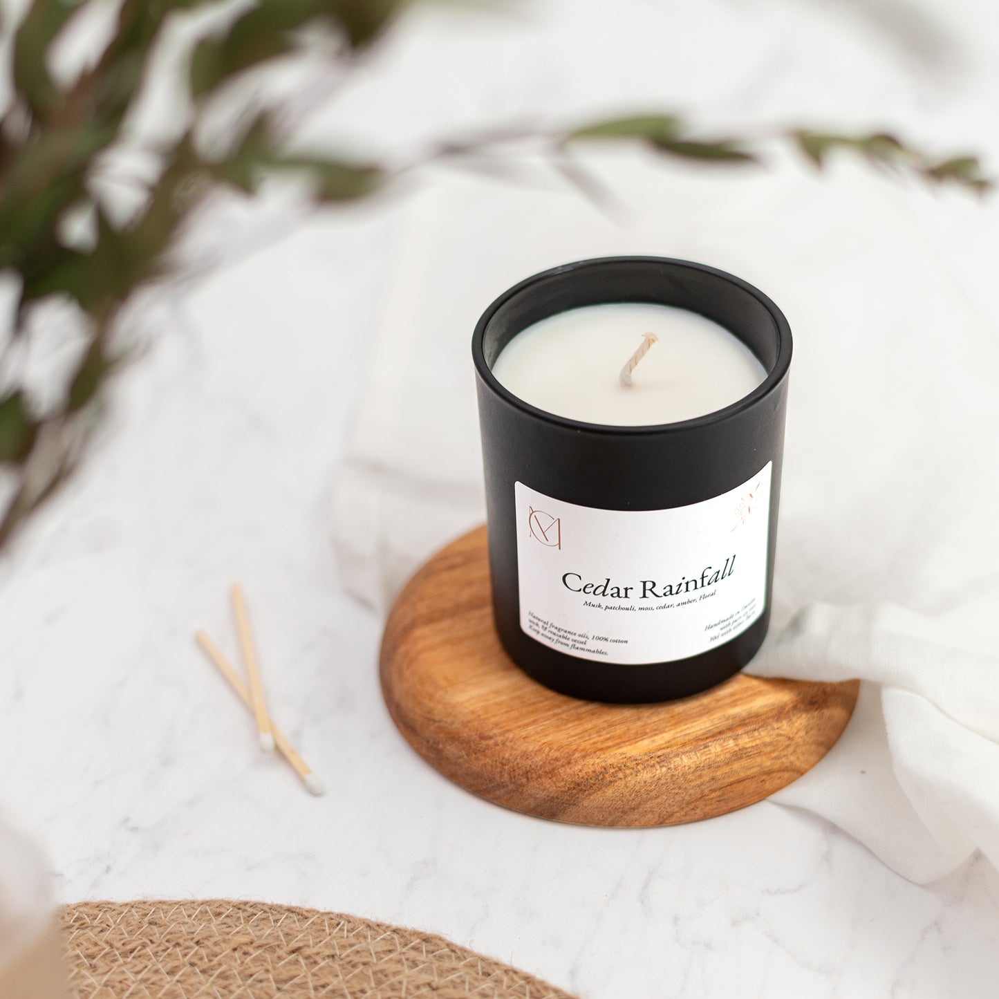 Petrichor soy candle in black jar with wooden lid, 220g jar by My Ariella Candles handmade in Dundee UK