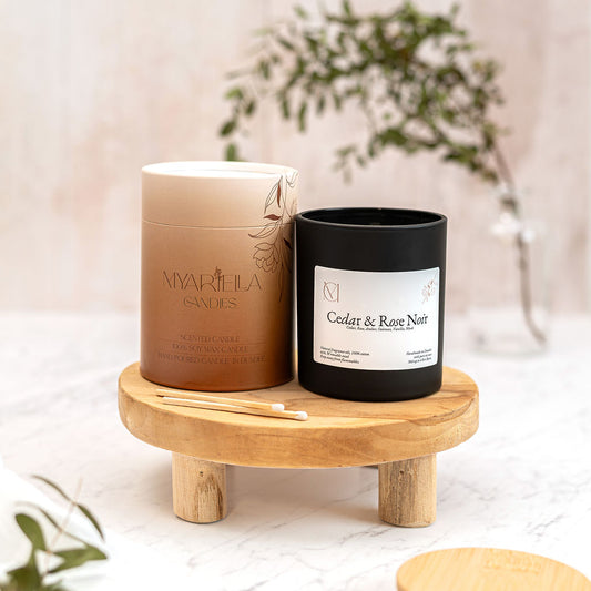 Cedar Rose Noir soy candle by Myariella Candles, a handmade luxury woody amber candle with rose and cedar inspired by Arabesque fragrance oil, made in Dundee UK. candle in a black glass candle jar