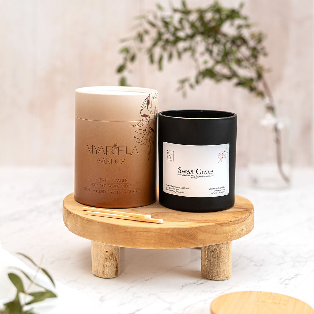Sweet Grove Orchard scented candle by Myariella Candles, a fruity handmade candle in Dundee UK with rhubarb, apple, pear and plum notes. candle in a black jar