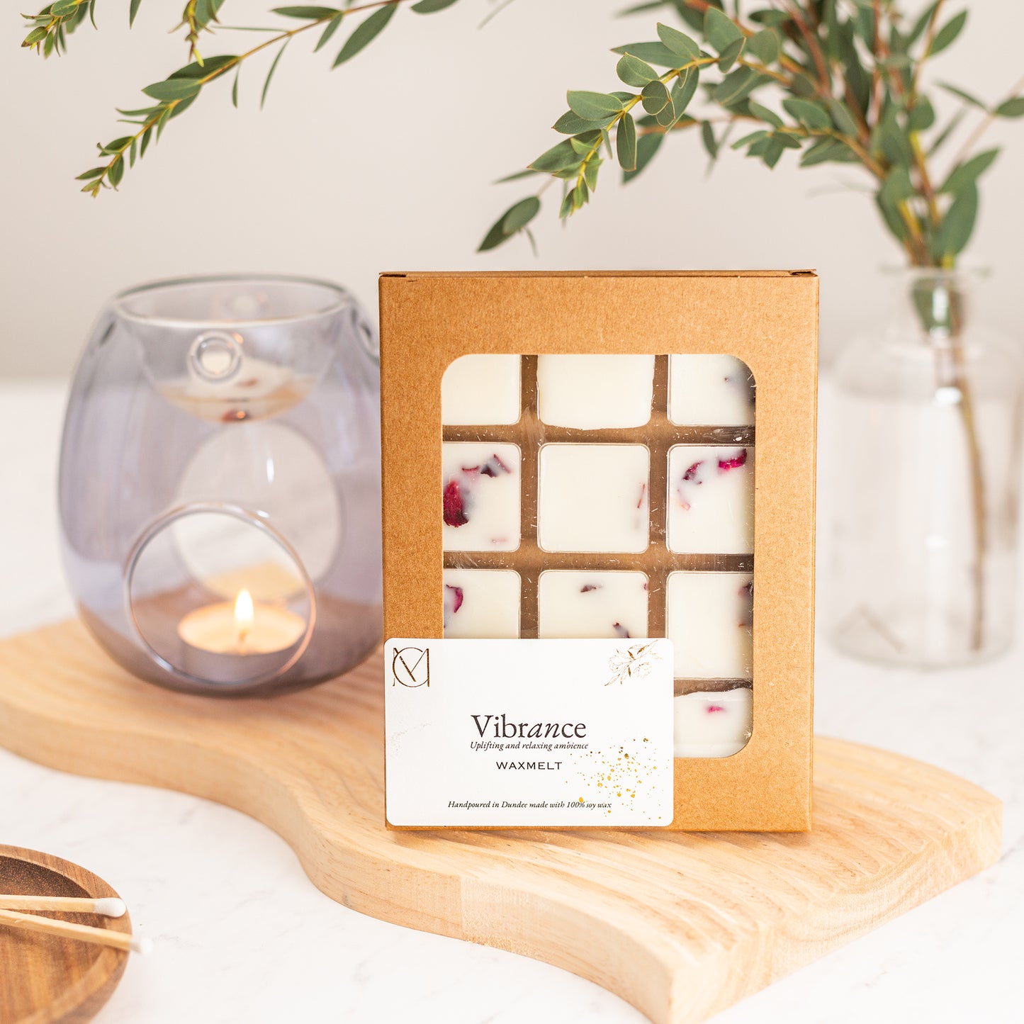 Close up of handmade wax melts infused with fragrance oil and botanical flowers UK